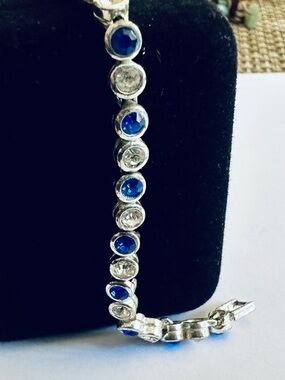 AVON Silver Plated Tennis Bracelet with Blue & Clear CZ Size Small